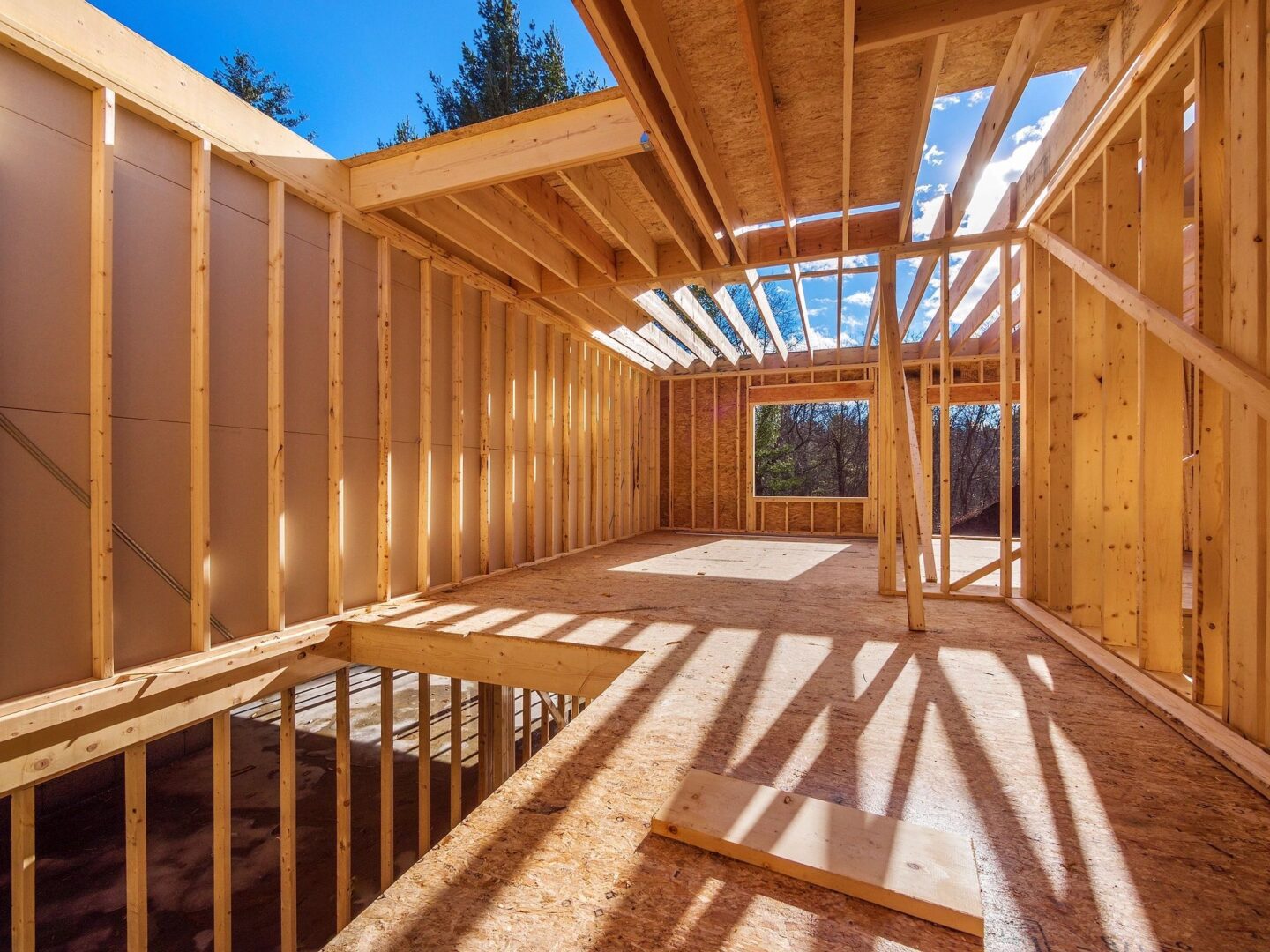 House under construction, wooden frame.