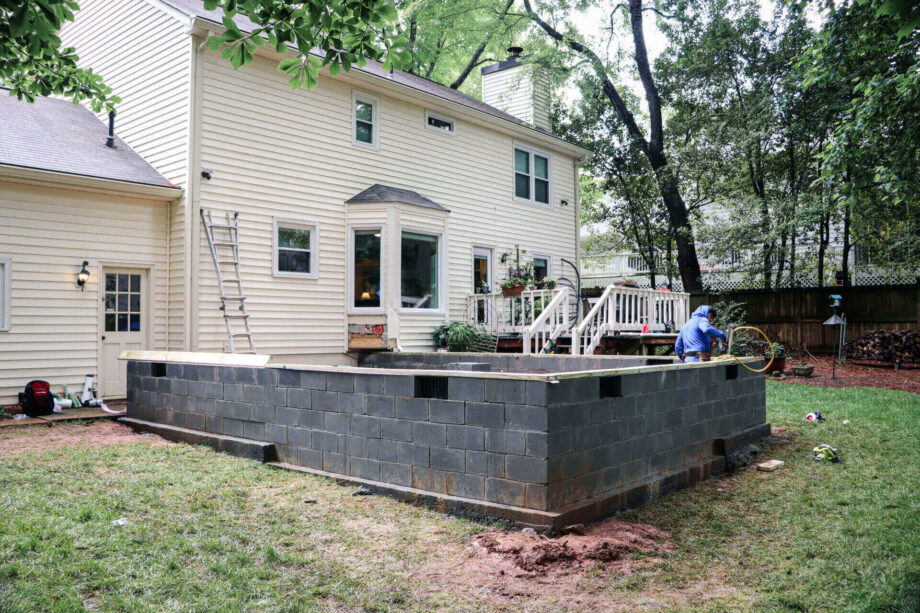 Home extension under construction, backyard view.